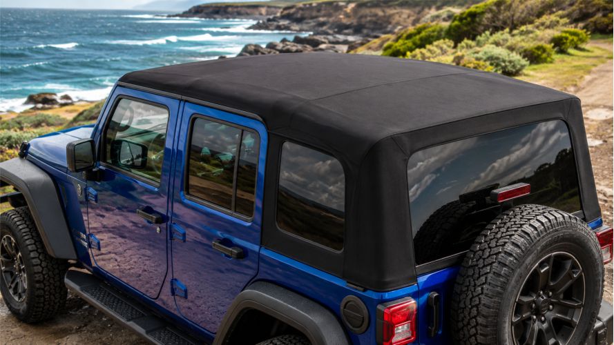 Black soft-top outdoors ready for fabric roof cleaning